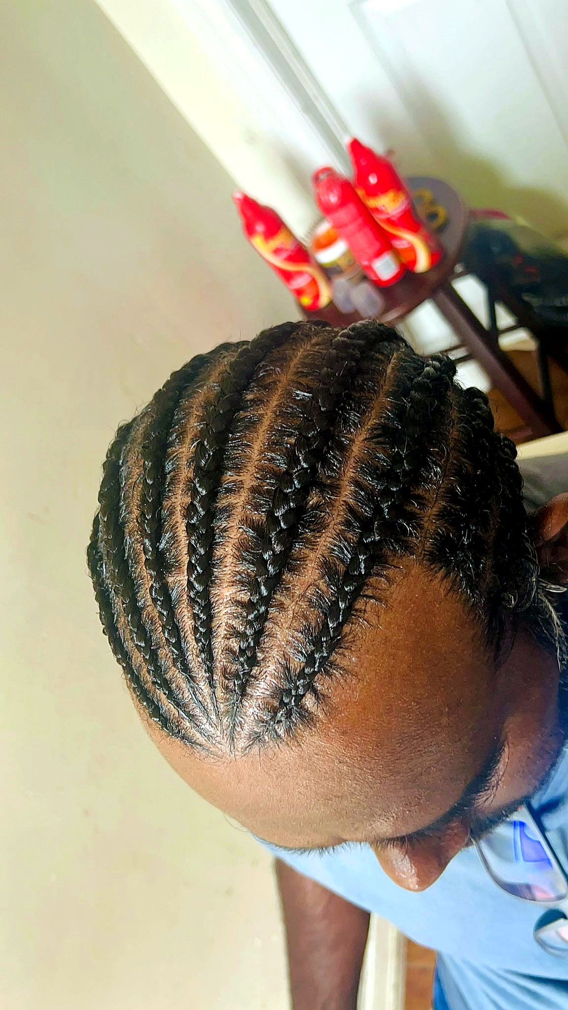Men's radial cornrow pattern